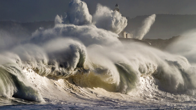 Large wave beach lighthouse cloudy free wallpaper - medium preview image