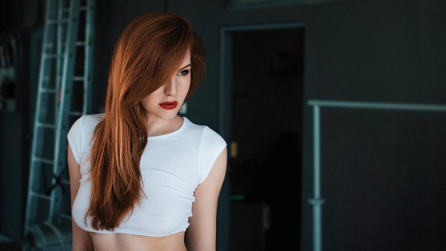 Red haired woman white top free wallpaper - medium preview image