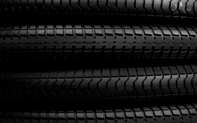 Tire closeup black background white free wallpaper - medium preview image