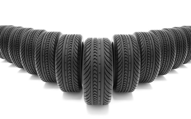 Tires stacked white background shadow free wallpaper - medium preview image