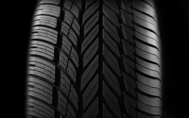 Tire closeup black background white #2 free wallpaper - medium preview image