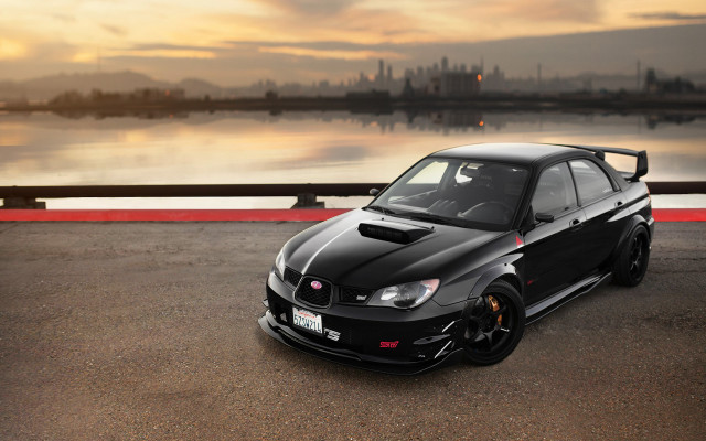 Black car water city sunset free wallpaper - medium preview image