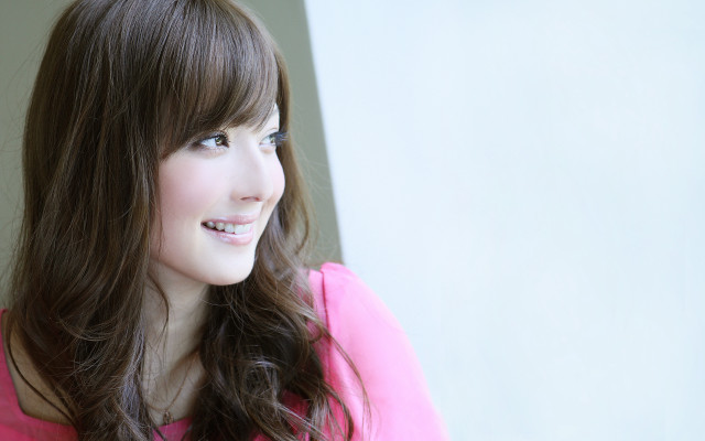Woman smiling longhair pinkshirt whitewall free wallpaper - medium preview image
