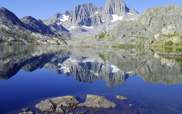 Mountain reflection lake rocks grass #2 free wallpaper - medium preview image