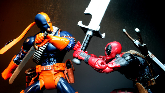 Action figures swords comic scene free wallpaper - medium preview image