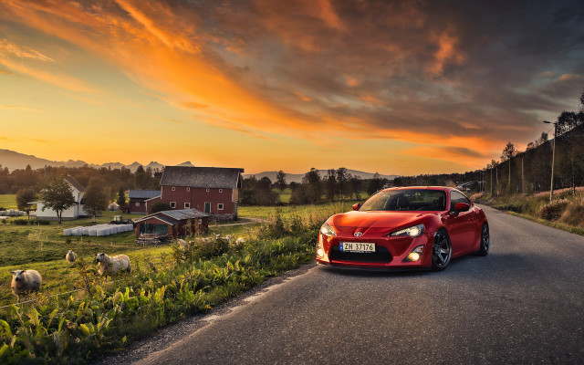 Red sports car farm house free wallpaper - medium preview image