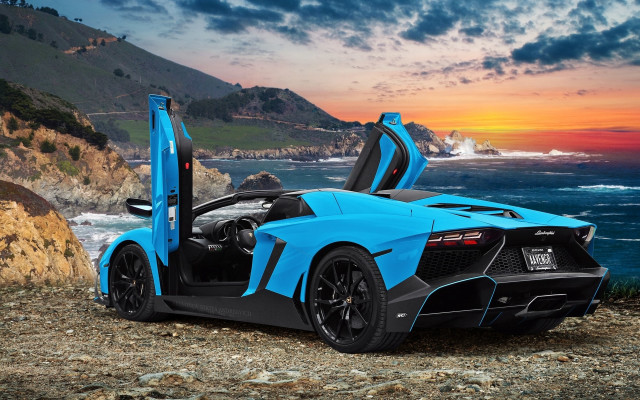 Blue sports car rocky beach free wallpaper - medium preview image