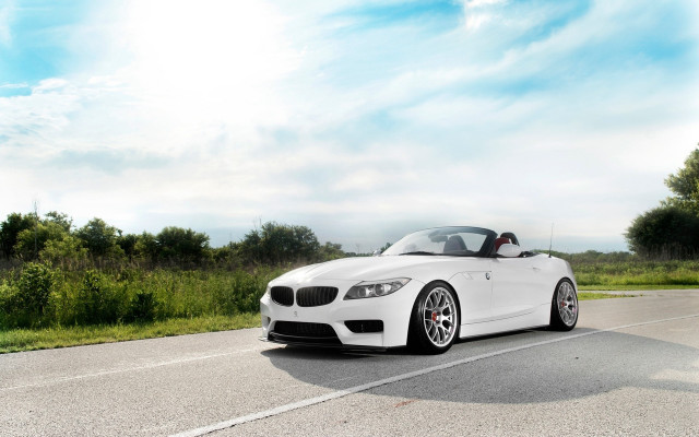 White convertible car green field free wallpaper - medium preview image
