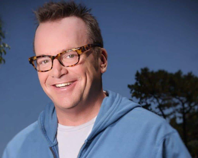 Man blue hoodie glasses smile free wallpaper - medium preview image