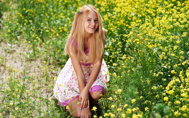 Woman sitting field flower smiling free wallpaper - medium preview image