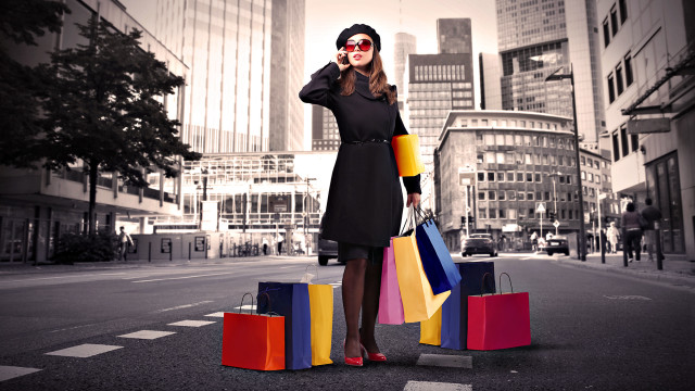Woman shopping black dress cityscape free wallpaper - medium preview image