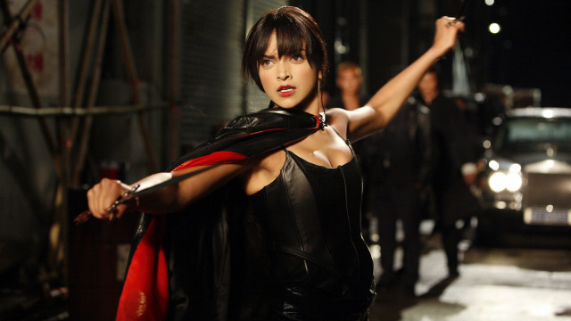 Woman leather redscarf blackjacket street free wallpaper - medium preview image