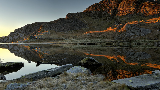 Mountain lake reflections sunset rocks free wallpaper - medium preview image