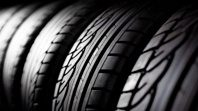 Tires lined up dark room free wallpaper - medium preview image