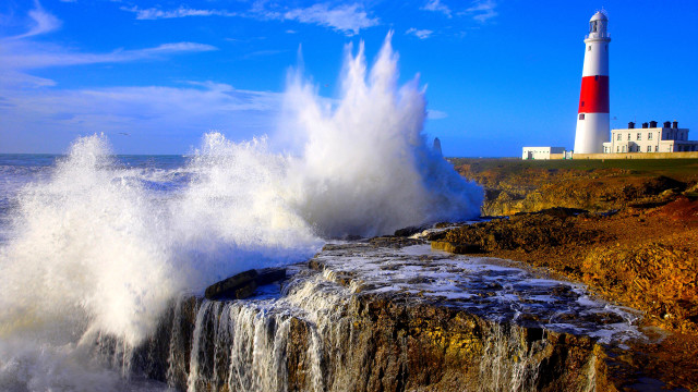 Lighthouse wave cliff beach city free wallpaper - medium preview image
