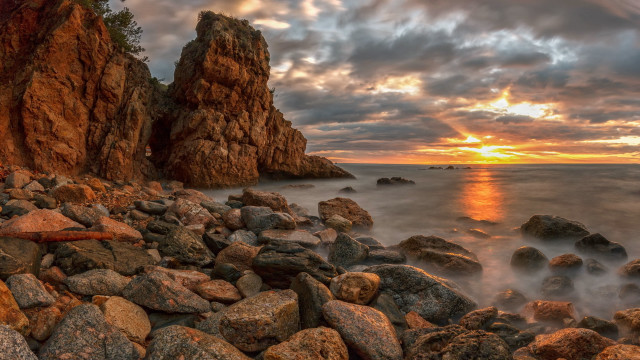Rocky beach sunset surfboard mountains free wallpaper - medium preview image