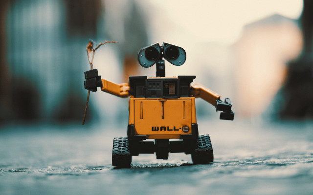Yellow robot building beach ocean free wallpaper - medium preview image