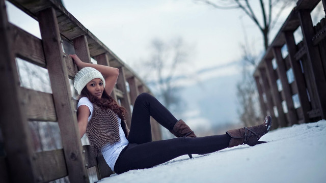 Woman sitting bridge snow hat free wallpaper - medium preview image