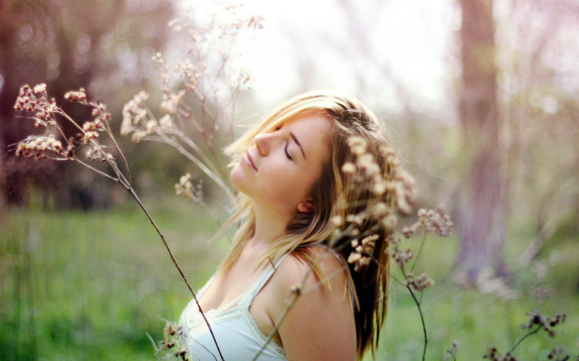 Woman standing field flowers closed free wallpaper - medium preview image