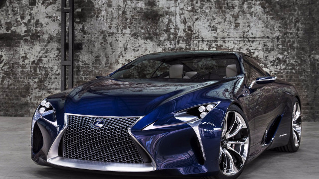 Blue sports car brick wall free wallpaper - medium preview image