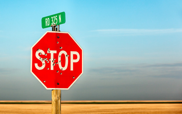 Stop sign street grass dirt free wallpaper - medium preview image