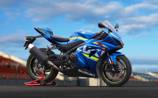 Blue motorcycle parking lot cloudy free wallpaper - medium preview image