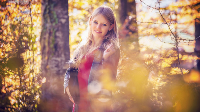 Woman woods backpack smiling autumn free wallpaper - medium preview image