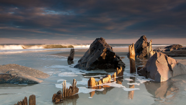 Beach rocks waves cloudy sky free wallpaper - medium preview image