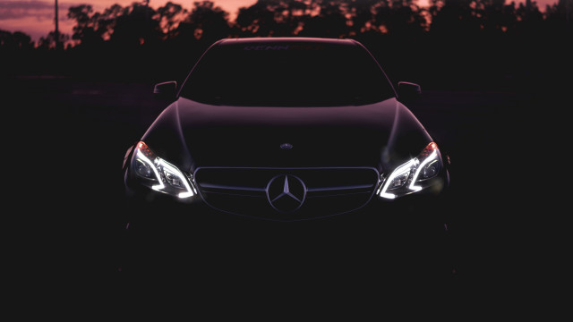 Car headlights sunset trees photorealistic free wallpaper - medium preview image