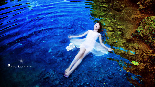 Woman floating water bag surreal #2 free wallpaper - medium preview image
