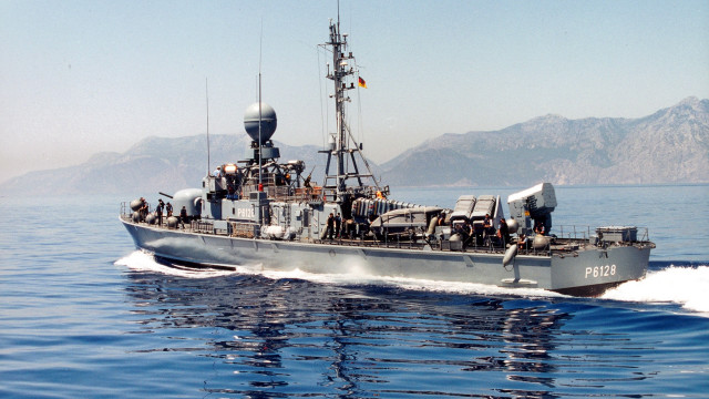 Battleship warship boat ocean mountains free wallpaper - medium preview image