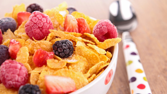 Cereal raspberries blueberries spoon napkin free wallpaper - medium preview image