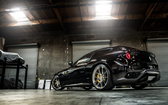 Black sports car garage man free wallpaper - medium preview image