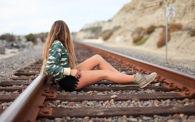 Traintrack sitting fashion blurry beach free wallpaper - medium preview image