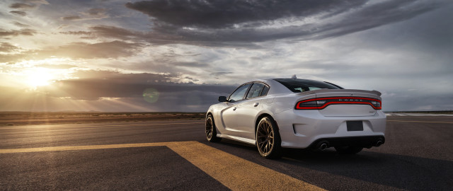 White car cloudy sky sunbeams free wallpaper - medium preview image