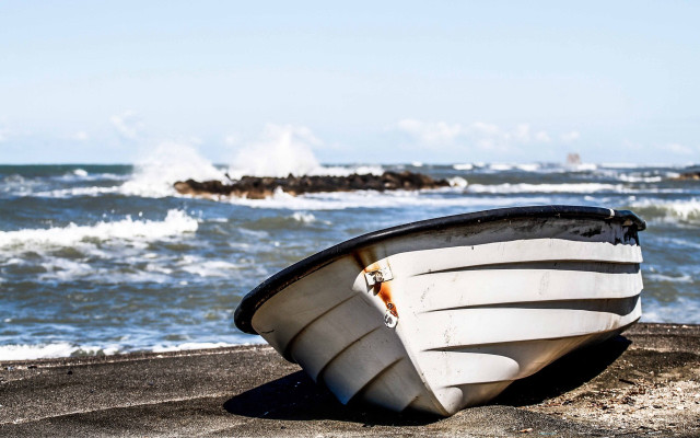 Boat beach ocean waves rocks free wallpaper - medium preview image