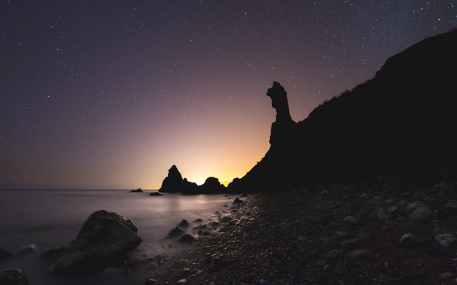 Rocky beach star filled sky free wallpaper - medium preview image