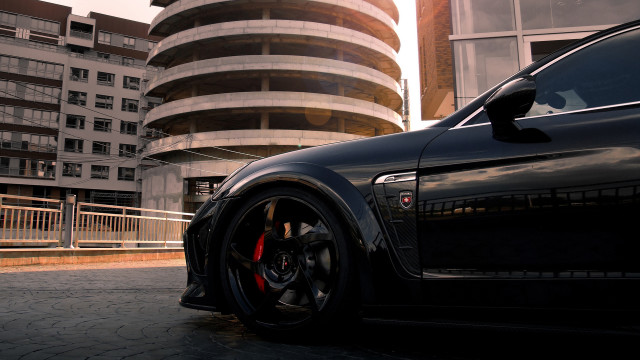Black car tall building circular free wallpaper - medium preview image