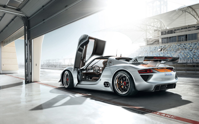 White sports car garage open #2 free wallpaper - medium preview image