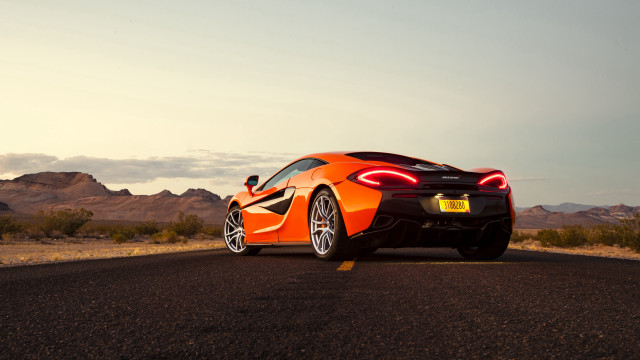 Desert mountains car road sky free wallpaper - medium preview image