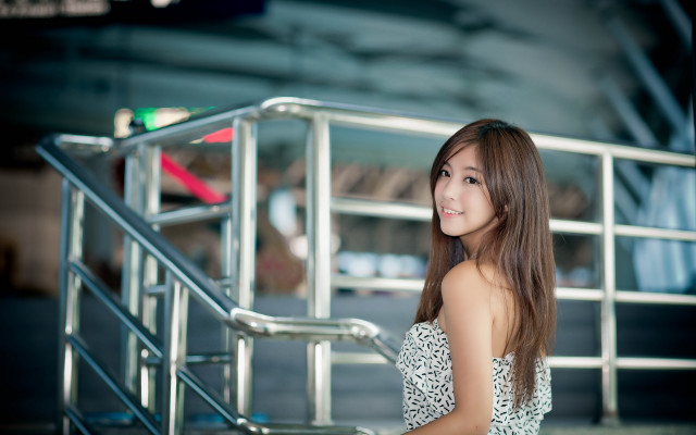 Woman smiling dress railing classroom free wallpaper - medium preview image
