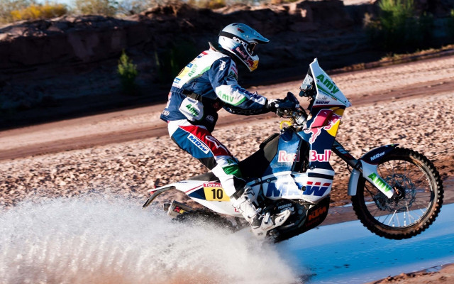 Man dirtbike puddle desert action free wallpaper - medium preview image