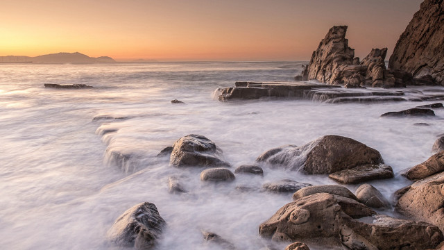 Rocky beach sunset island ocean #2 free wallpaper - medium preview image