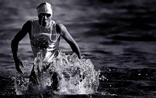 Man wet suit running water free wallpaper - medium preview image