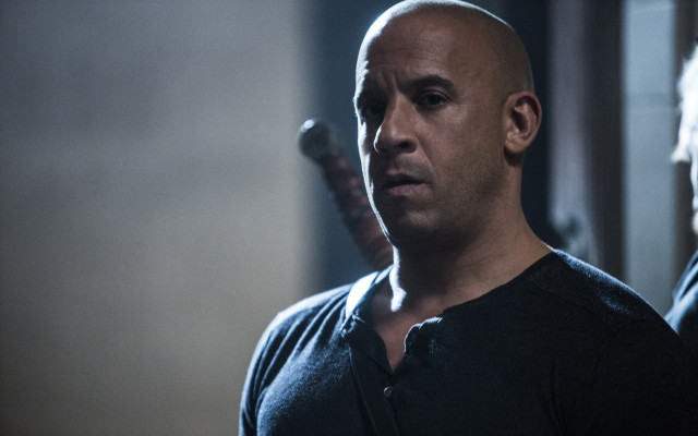 Bald man black shirt looking #2 free wallpaper - medium preview image
