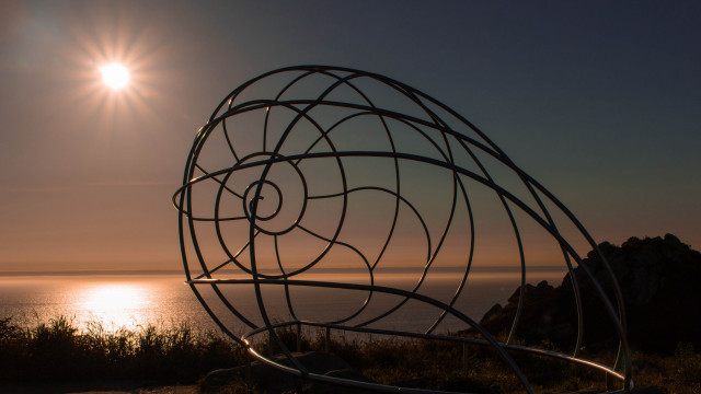 Sculpture ocean sunset abstract lensflare free wallpaper - medium preview image