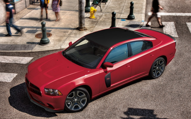 Red car sidewalk people building free wallpaper - medium preview image
