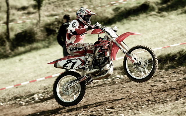 Man riding dirt bike forest free wallpaper - medium preview image