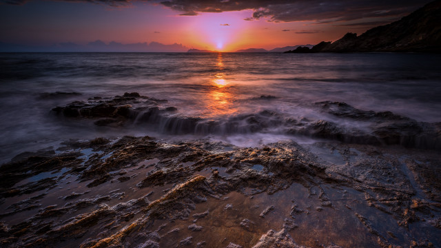 Sunset ocean waves rocks mountain free wallpaper - medium preview image