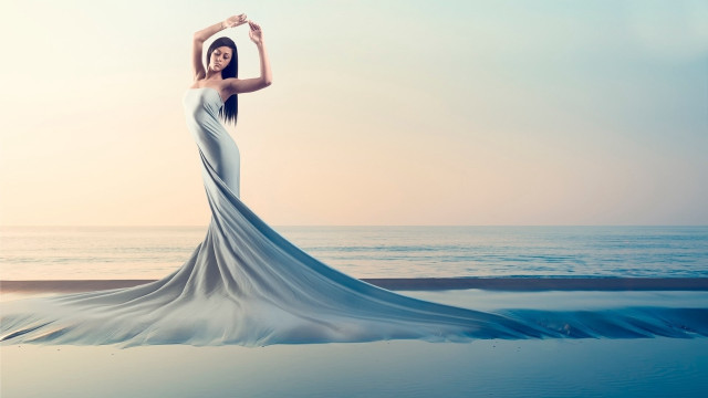 Woman beach arms up ocean free wallpaper - medium preview image